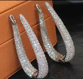 Boucles gouttes strass argentées