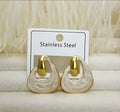 Boucles d'oreilles résine beige