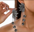 Boucles d’oreilles feuilles noires pendantes
